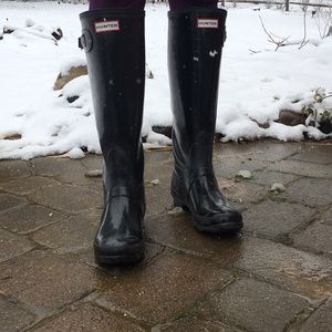Black tall Hunter boots